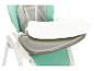Une chaise haute pour bébé vert menthe et grise avec un plateau blanc amovible.