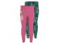 Deux leggings pour enfants, un rose avec un personnage de dessin animé et un vert à motifs de feuilles.
