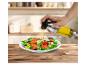 Metmaxx vaporisateur d'huile sur une salade.