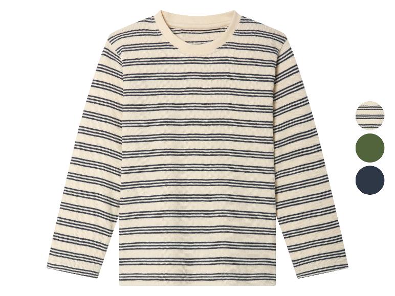 Pull à rayures crème et bleu marine.