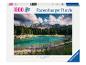 Puzzle Ravensburger de 1000 pièces représentant un lac de montagne avec des montagnes et une forêt.