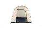 Tente de camping beige et bleu marine, ouverte.