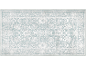 Tapis rectangulaire avec motif floral abstrait et bordure décorative, dans des tons bleus et blancs.