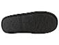 Semelles de pantoufles noires avec motif texturé.