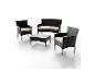 Ensemble de mobilier de jardin en rotin noir avec coussins beiges et table basse en verre.