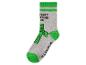 Chaussette rayée grise et verte avec un personnage pixélisé et du texte.