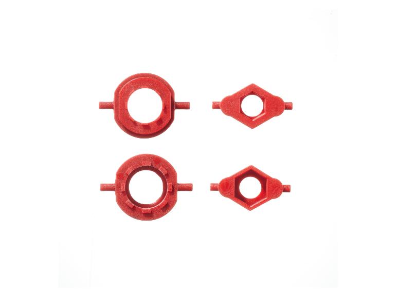 Quatre pièces en plastique rouge avec des trous.