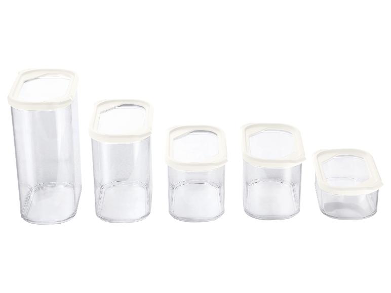 Ensemble de 5 récipients alimentaires transparents avec couvercles blancs.