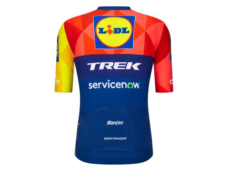 Maillot de cyclisme rouge, jaune et bleu avec logo de supermarché et sponsors.