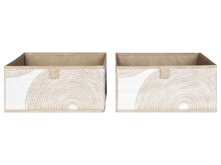 Deux boîtes de rangement beiges avec un motif géométrique.
