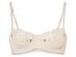 Un soutien-gorge beige avec de la dentelle et un motif floral.