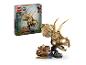 Ensemble LEGO Jurassic World avec un crâne de Triceratops et une figurine.