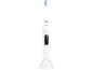 Brosse à dents électrique blanche sur base de chargement avec poils bleus et verts.