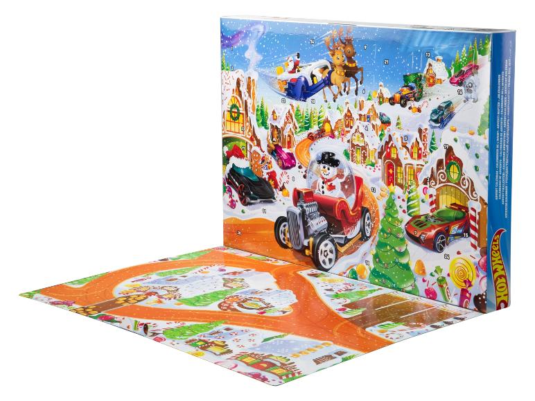 Calendrier de l'Avent Hot Wheels sur le thème de Noël avec des voitures jouets.