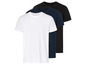 Trois t-shirts blancs, bleus et noirs.
