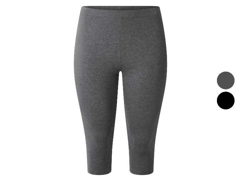 Legging capri gris foncé extensible, avec deux échantillons de couleur sur le côté.