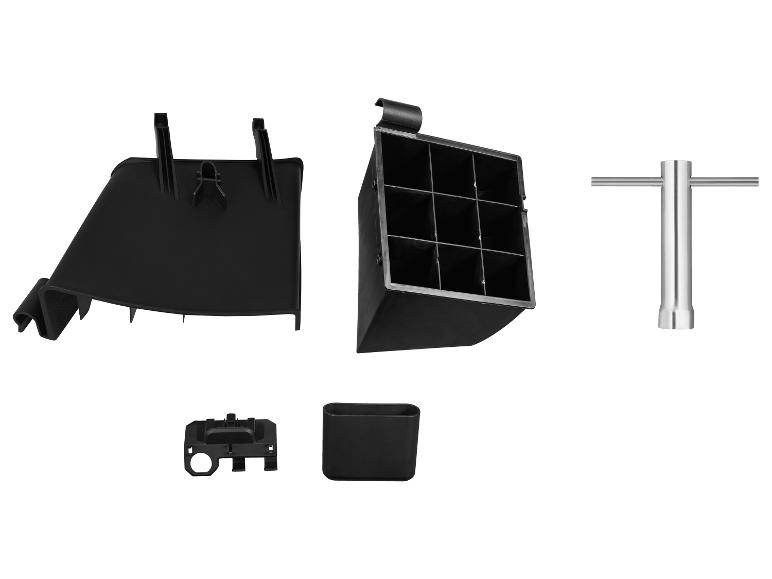 Pièces en plastique noir et clé métallique sur fond blanc.