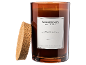 Bougie parfumée dans un pot en verre ambré avec un couvercle en liège, étiquetée 'Sage Serenity'.