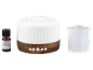 Diffuseur d'aromathérapie avec huile essentielle et verre doseur.