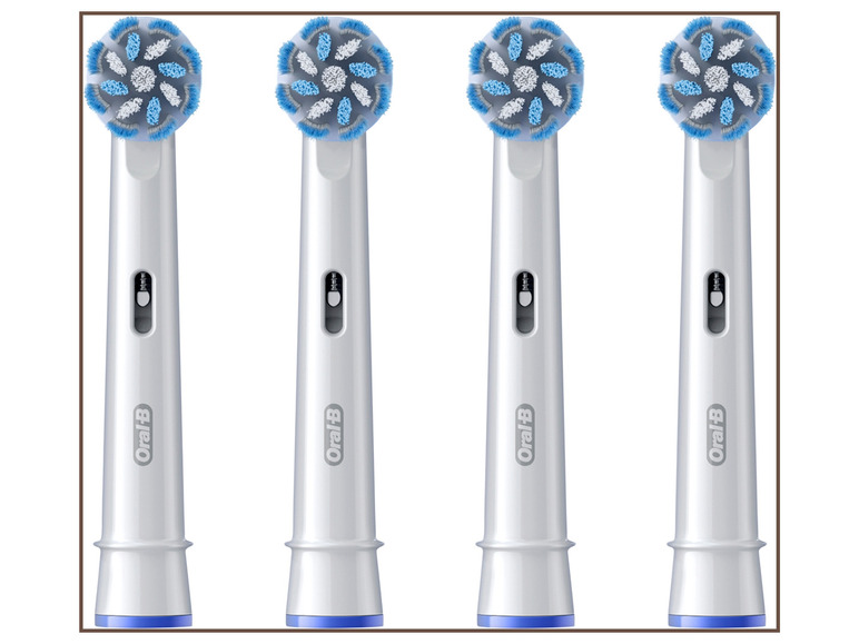 Quatre têtes de brosse à dents électriques Oral-B.