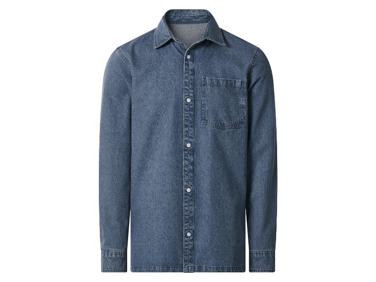 Chemise en jean bleue pour homme avec poche poitrine et boutons blancs.