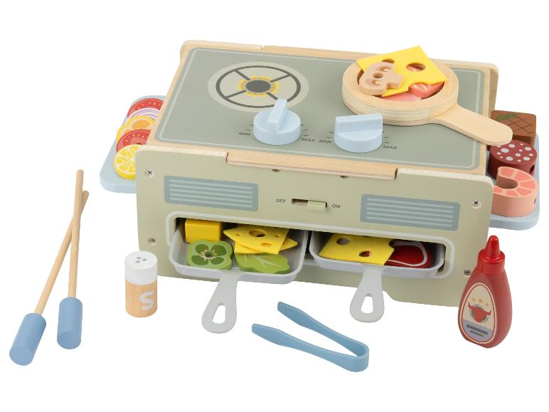 Ensemble de jeu barbecue en bois avec accessoires de cuisine, y compris nourriture et ustensiles.
