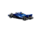 Voiture de course miniature bleue avec des roues à liseré blanc sur fond noir
