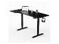 Bureau noir réglable avec ordinateur portable, souris, tasse, plante et casque.