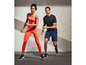 Une femme et un homme en tenue de sport Puma, prêts à s'entraîner.