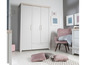 Une armoire blanche à trois portes et un tiroir, un fauteuil rose et des coussins décoratifs.