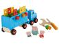 Un camion de jouet en bois avec des vis, des écrous, un tournevis et une clé, avec des personnages de Peppa Pig.