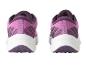 Chaussures de course violettes avec une semelle blanche.
