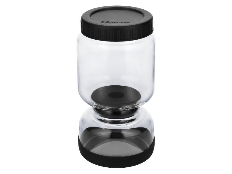 Bocal en verre transparent avec couvercle et base noirs