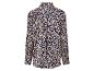 Une chemise bleue à manches longues avec un imprimé floral beige.