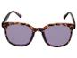 Lunettes de soleil avec monture écaille de tortue et verres violets.