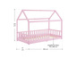 Un lit en bois rose avec une tête de lit en forme de maison.