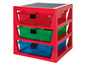 Rangement rouge avec trois tiroirs pour les briques LEGO.