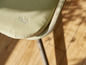 Une chaise de jardin verte de Sienna Garden.