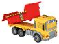 Un camion jouet jaune avec une benne basculante rouge