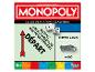 Jeu de société classique Monopoly avec dés, voiture de course et instructions en français.