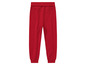 Pantalon de survêtement rouge pour enfant.