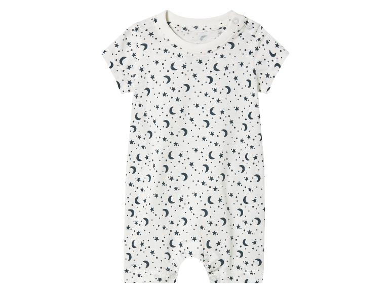 Combinaison bébé, motif étoiles et lunes.
