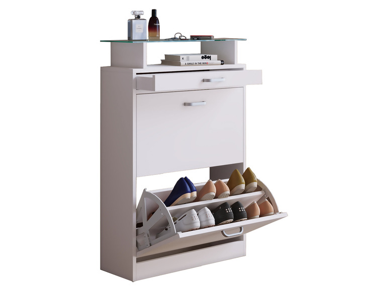 Une armoire à chaussures blanche avec un plateau en verre et des tiroirs.
