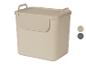 Boîte de rangement beige avec poignées.
