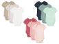 Bodys bébé: tons neutres et pastels.