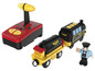 Une locomotive à vapeur noire avec des accents jaunes et une télécommande rouge.