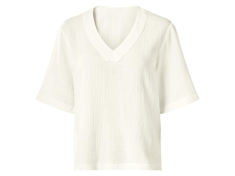 Haut blanc texturé à manches courtes et col en V