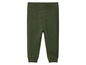 Pantalon de survêtement vert pour enfant.