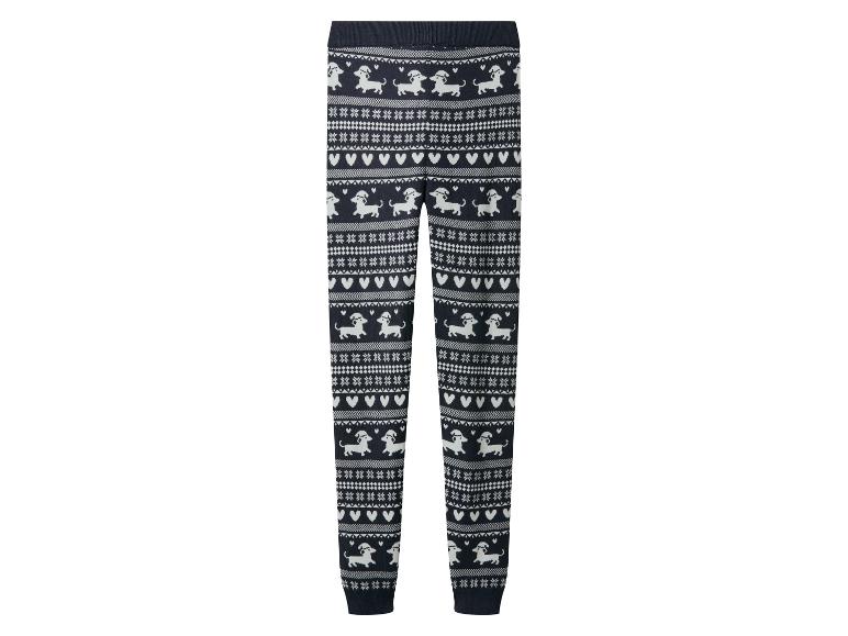 Legging tricoté bleu foncé avec motifs de teckels, cœurs et flocons de neige blancs.