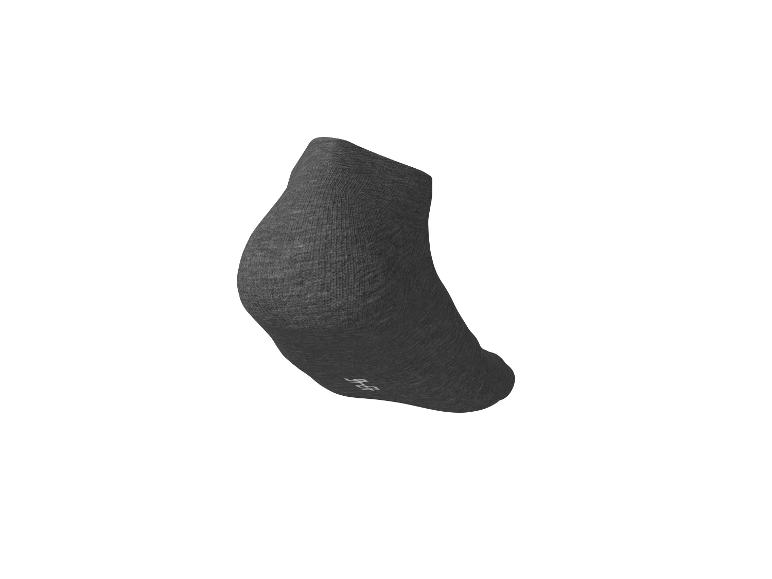 Chaussette courte gris foncé avec un logo blanc sur le dessous.
